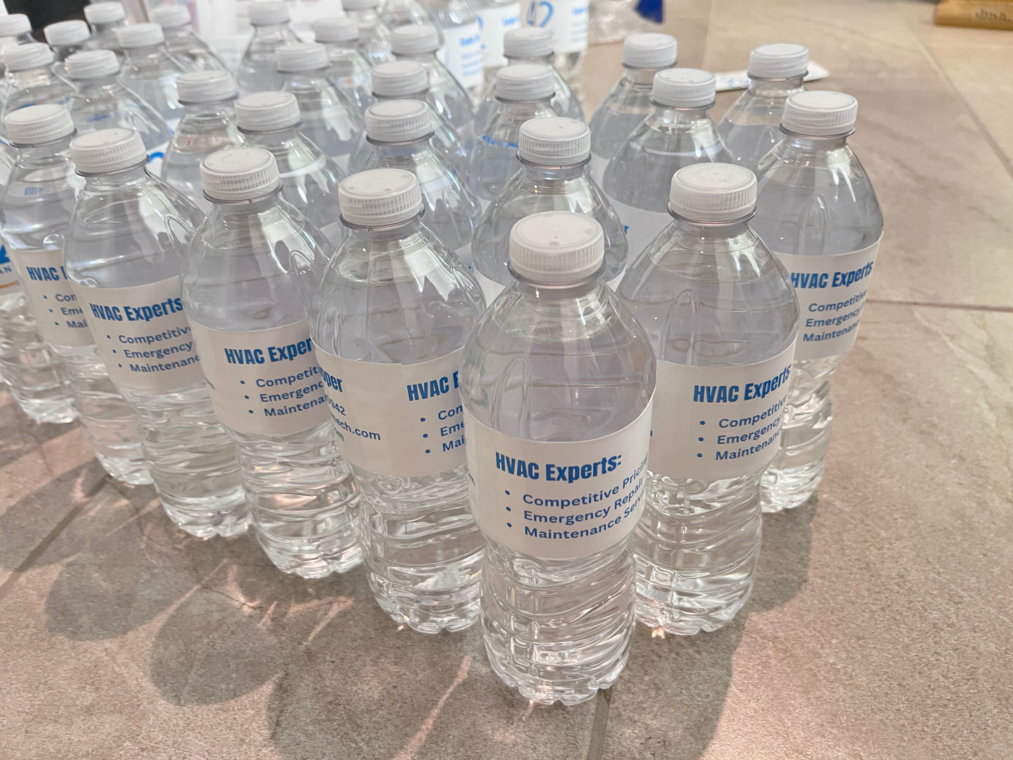 Water bottle with personalized information for branding, networking, promotion, and fun events