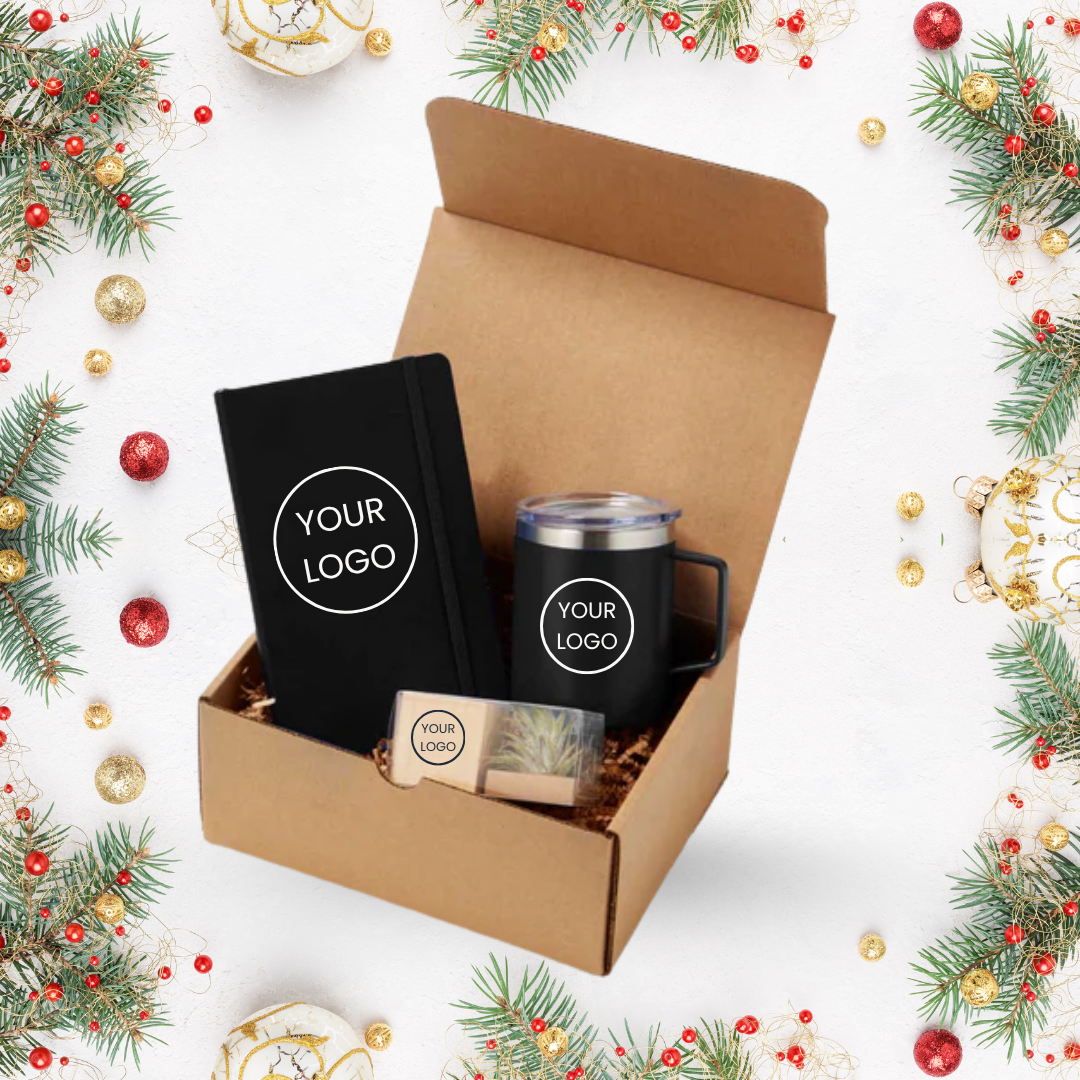 Corporate gift set featuring journal, travel mug, and desk plant