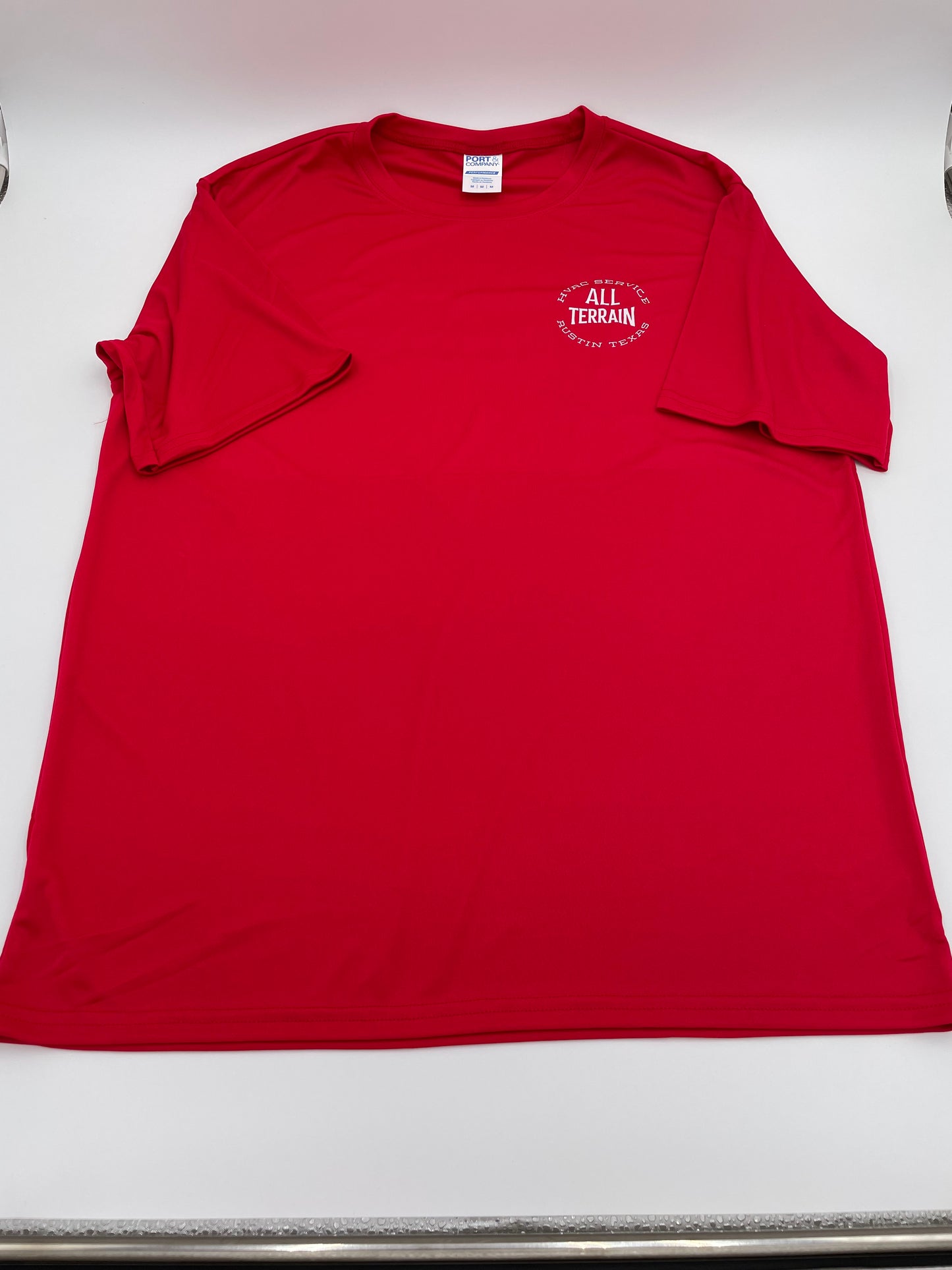 Red polo shirt with a logo on a white background. Custom t-shirt, logo personalized design, men’s/unisex fit, front/back view.. custom personalized t shirt unisex kid youth adult women men crew neck polyester moisture wicking cotton soft comfortable