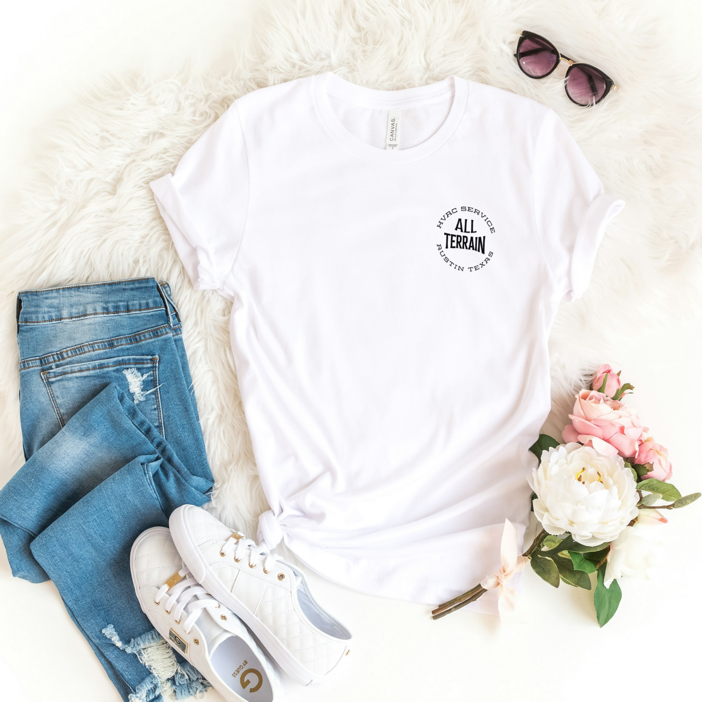 White t-shirt with text, blue jeans, white sneakers, sunglasses, and flowers on a white surface. Men women unisex sized Funny tshirt, fun t shirt, when the ladies get hot, when the ladies got hot, they call me, all terrain HVAC jokes, HVAC contractor shirts