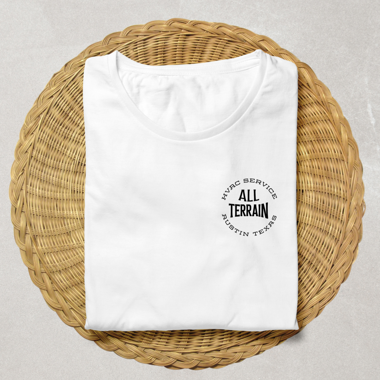 Folded white t-shirt with black text on a woven mat. Men women unisex sized Funny tshirt, fun t shirt, when the ladies get hot, when the ladies got hot, they call me, all terrain HVAC jokes, HVAC contractor shirts