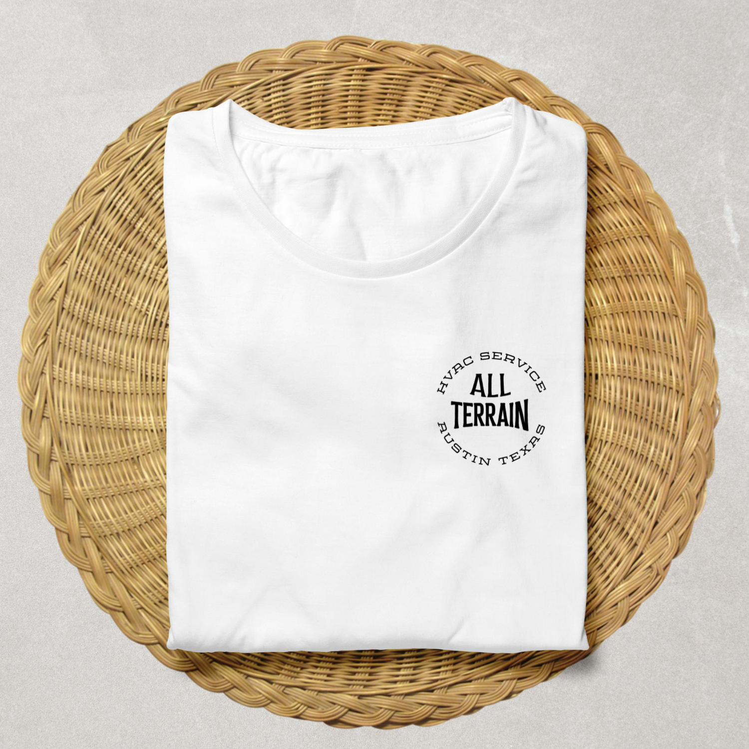 Folded white t-shirt with black text on a woven mat. Men women unisex sized Funny tshirt, fun t shirt, when the ladies get hot, when the ladies got hot, they call me, all terrain HVAC jokes, HVAC contractor shirts