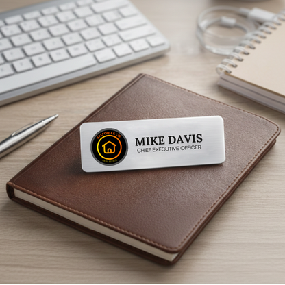 Custom printed aluminum name badge for trade shows and corporate events, offering clear text and vibrant branding