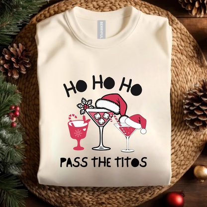 Beige sweatshirt with Christmas-themed design featuring cocktails and Santa hats on a woven surface. holiday funny t shirt