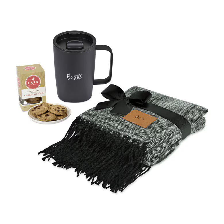 All Wrapped Up Gift Set with cozy throw blanket, ceramic mug, and gourmet cookies