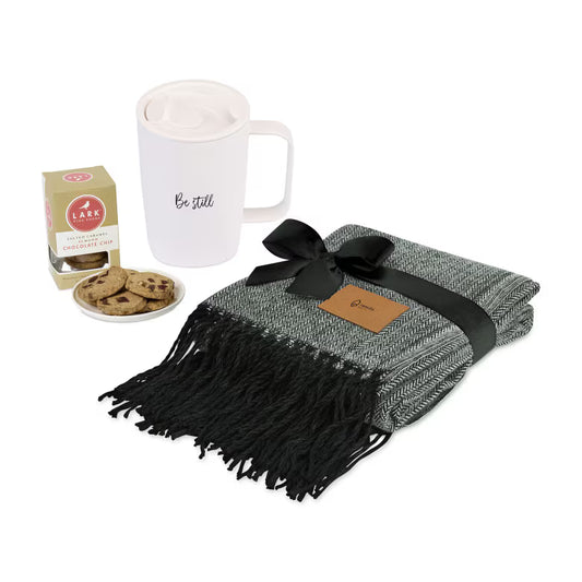 Customizable corporate gift set with blanket, mug, and sweet treats
